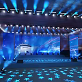 Event Stage With Blue Lights LED Screens And Star Floor