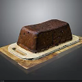 Moist Fruit Cake With Glazed Surface On Wooden Tray And Dried Fruits Decoration