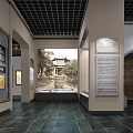 Indoor Cultural Exhibition Wall With Black White Drawings Texts Circular Sign And Green Plant