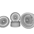 Stylish Three Automotive Wheel Rims and Tire Black Silver Red Accent on Wooden Floor