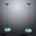 Two Elegant Hanging Chandeliers With Light Green Patterned Shades