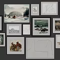 Various Style Frames With Artworks And Photos Hanging On White Wall