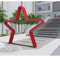 Garden Landscape Featuring Inscribed Stone Monument Lush Green Plants And Red Star Structure