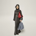 Woman in Black Abaya and Hijab Holding Red Bag and Blue Handbag Against Light Background