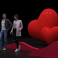 Red Heart Sculptures And Wave Structures Photo Spot For People Taking