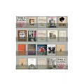 Books and Magazines Display On Glass Shelves With Various Art Design and Lifestyle Covers