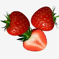 Three Fresh Ripe Strawberries With One Halved Showing Juicy Red Flesh And Green Leaves