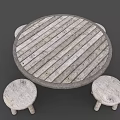 Round Wooden Table with Striped Top and Cross Base and Two Small Matching Stools