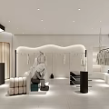 Modern Clothing Store Front With Glass Window Mannequins And Hanging Outfits
