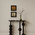 Elegant Wooden Entryway Console Table With Bamboo Vase And Framed Paintings