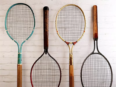 Vintage Tennis Rackets Hanging On White Brick Wall For Sports Equipment 3d model
