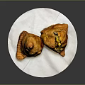 Crispy Fried Triangular Samosa With Vegetable Filling On White Plate