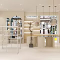 Modern Stylish Boutique Interior With Metal Display Racks Round Counter Pendant Lights And Green Plants