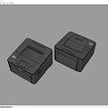 Two Black Desktop Printers On Light Blue Background With Compact Design