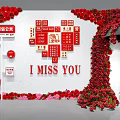 Romantic Decorative Scene With Red Roses White Wall I MISS YOU Text And Red Signs