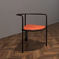 Modern Dining Chair With Black Frame Orange Padded Seat And Armrests On Wooden Herringbone Floor