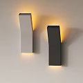Modern White and Black Wall Lamps Mounted on Wall with Warm Yellow Light