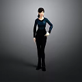 Stylish Woman In Dark Blue Top And Black Pants Standing With Hand On Hip