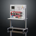 Professional Test Equipment With Display Screen Buttons Interfaces And Colored Wires On Wheeled Metal Stand