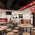 Modern Hot Pot Restaurant Interior With Wooden Tables Round Stools Counter And Menu Boards