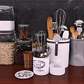 Kitchen Utensils Arrangement With Storage Jars On Countertop 3d model