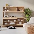 Wooden Sideboard with Dishes Decorations and Appliance in Living Room with Plant Cat and Sofa