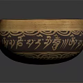 Intricate Carved Sculpture Bowl With Gold And Black Ornate Patterns And Traditional Designs