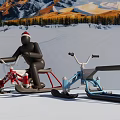 Red And Blue Snow Bikes Sports Equipment In Snowy Mountain Forest Background