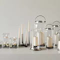 Stylish Kitchenware Display With Glass Metal Candle Lanterns And Lit Candles