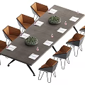 Modern Conference Table With Brown Chairs Green Plants White Papers And Pink Items