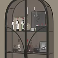 Elegant Decorative Cabinet With Glass Shelves Holding Wine Bottles Glassware And Photo Frames