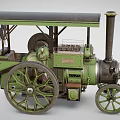 Green Vintage Steam Powered Functional Vehicle With Big Wheels And Cabin