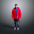 Man wearing red puffer jacket blue shirt gray pants and gray shoes against gray background
