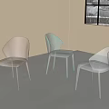 Three Modern Transparent Acrylic Leisure Chairs with Sleek Design in Different Colors Bright Room