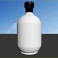 White Wine Bottle With Silver Cap On Gray Countertop Against Blue Sky
