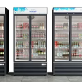 Three Glass Door Commercial Display Refrigerators With Beverages In Supermarket