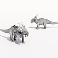 Two Decorative Toy Dinosaur Models With Saddle And Horned Features 3d model