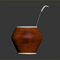 Traditional Mate Drink in Red Calabash with Green Liquid and Metal Straw