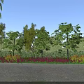 Woman standing near road with palm trees green trees flower bed and blue sky