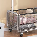 Modern Clothes Rack With Hanging Clothes And Bottom Basket In Indoor Setting