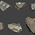 Different Natural Stone And Wood Pieces Showcasing Diverse Textures And Shapes