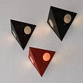 Triangular Black and Red Wall Lamps with Circular Cutouts Mounted on White Wall 3d model