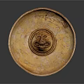 Decorative Ornament Set Featuring Circular Ceramic Plate With Carved Smiley Face Orange Yellow Cracked Texture