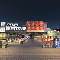 Illuminated Night Commercial Street With Outdoor Market Colorful Stalls And Dining Areas