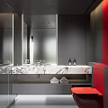 Modern Bathroom With Marble Countertop Mirrors And Red Accents