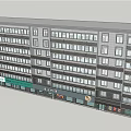 Modern Multistorey Building Exterior With Ground Floor Shops And Numerous Windows