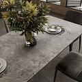 Modern Dining Table Set With Six Grey Chairs Floral Centerpiece And Fireplace