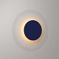 Modern Minimalist Wall Light with Round Deep Blue Center Warm Yellow Glow on White Wall