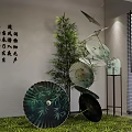 Indoor Art Installation With Green Umbrella Bamboo Calligraphy And Green Plants