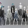 Stylish Mannequins Wearing Various Fashionable Outfits in Different Poses